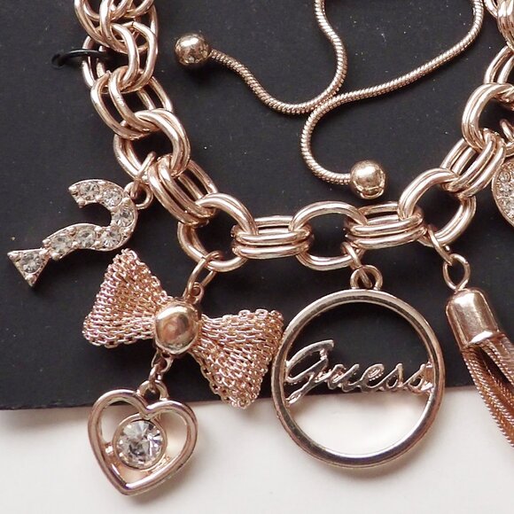 Guess Rose Gold Colored Charm Bracelet Adjustable Heart Tassel Question Mark NWT - Picture 2 of 5